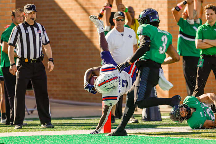 FAU’s Larry McCammon III dives for a touchdown vs. North Texas.